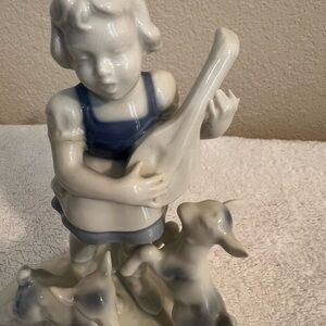Porcelain Figurine with Blue and White Accents